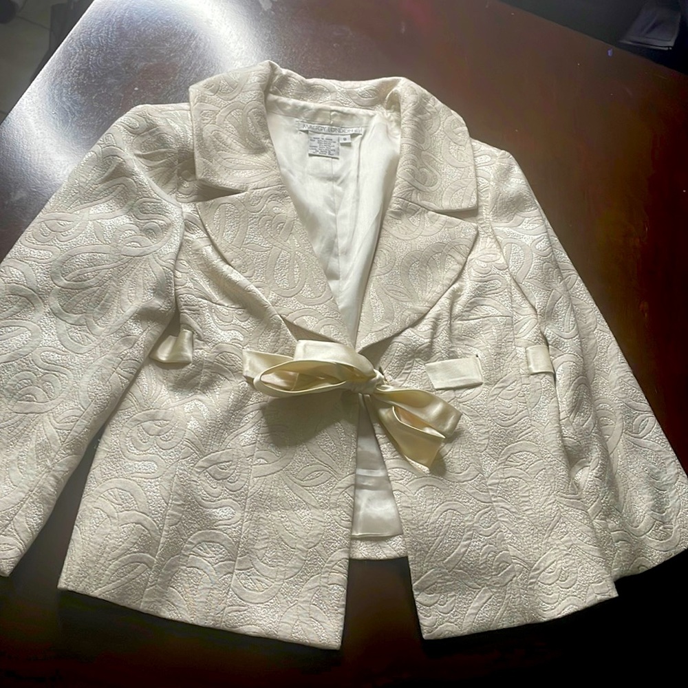 Cream with elegant design, tie front blazer